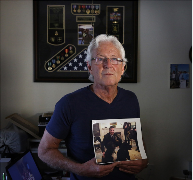 "William Owens holds a photo of his son, Navy SEAL William "Ryan" Owens, in Lauderdale-by-the-Sea, Florida." (NBC, October 1st 2017) William "Ryan" Owens was killed during the raid.
