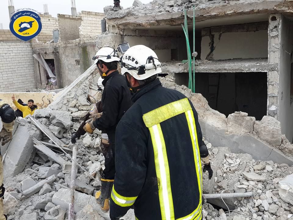 Members of the White Helmets search for survivors following a strike on Bab al Hawa, Jan 22nd (via White Helmets)