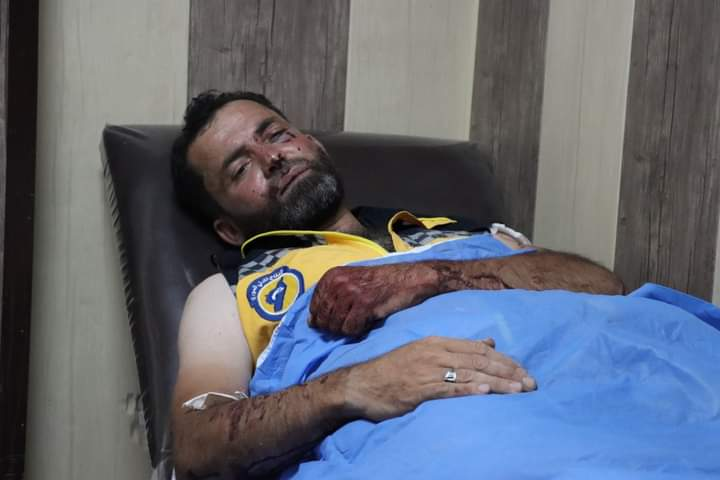 Injured Civil Defense member following a double strike on Sarja on July 17, 2021. (Image posted by @anasanas84)