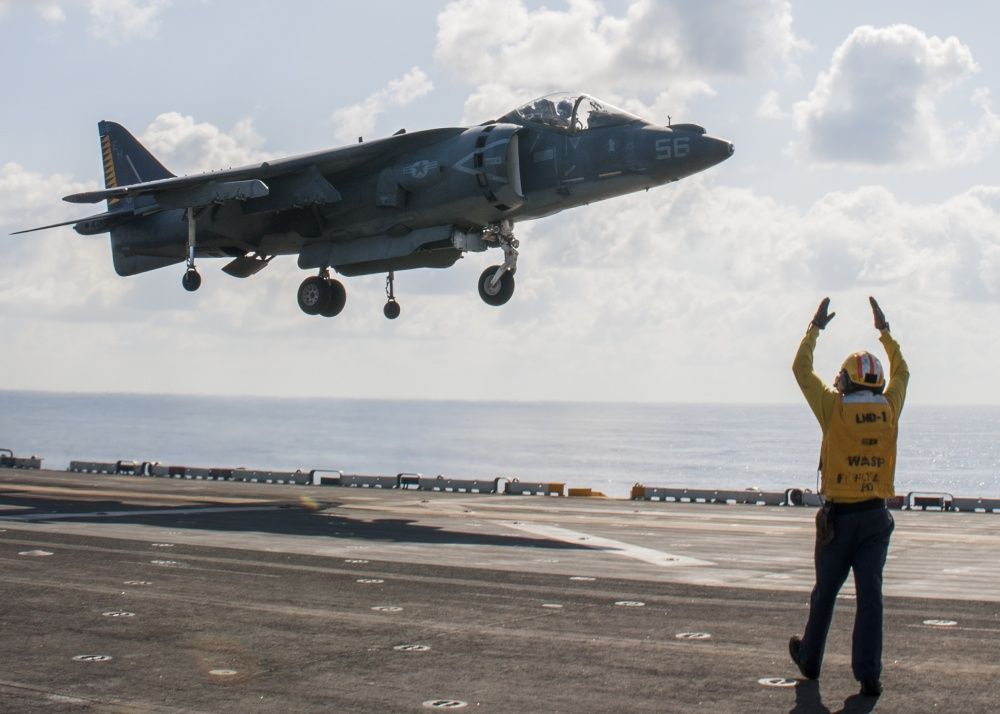 An AV-8B Harrier performs a vertical take off from USS Wasp, Oct 12th (US Navy)