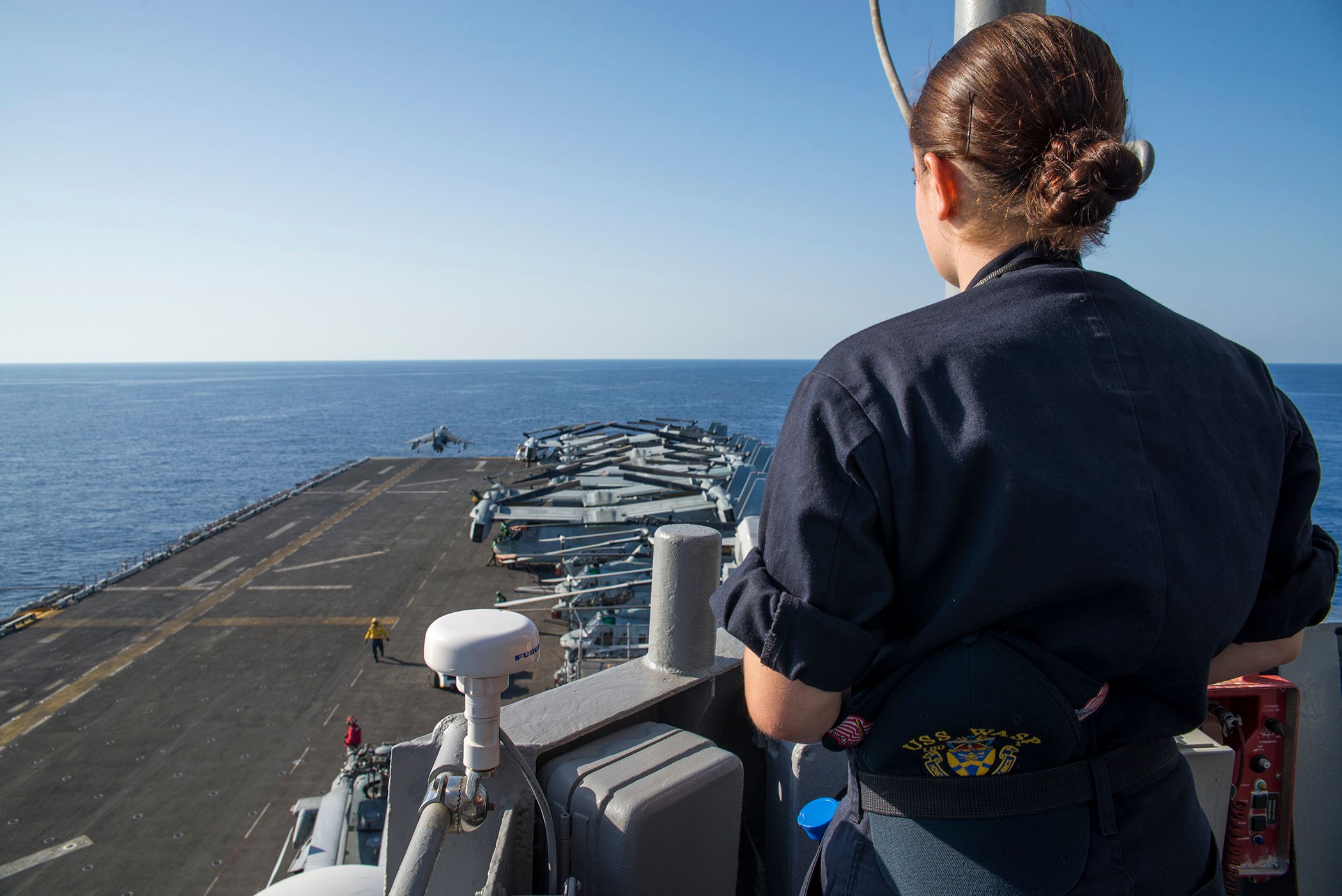 160811-N-VK310-050 MEDITERRANEAN SEA (Aug. 11, 2016) A Sailor watches an AV-8B Harrier, from the 22nd Marine Expeditionary Unit (MEU), take off from the flight deck of the amphibious assault ship USS Wasp (LHD 1) Aug. 11, 2016. The 22nd MEU, embarked on Wasp, is conducting precision air strikes in support of the Libyan Government of National Accord-aligned forces against Daesh targets in Sirte, Libya, as part of Operation Odyssey Lightning. (U.S. Navy photo by Mass Communication Specialist 3rd Class Michael Molina/Released)