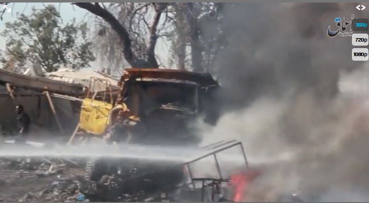A still from an Al A'Amaq propaganda video showing the site of a reported Coalition strike at al Kalta which targeted a truck but also killed two children