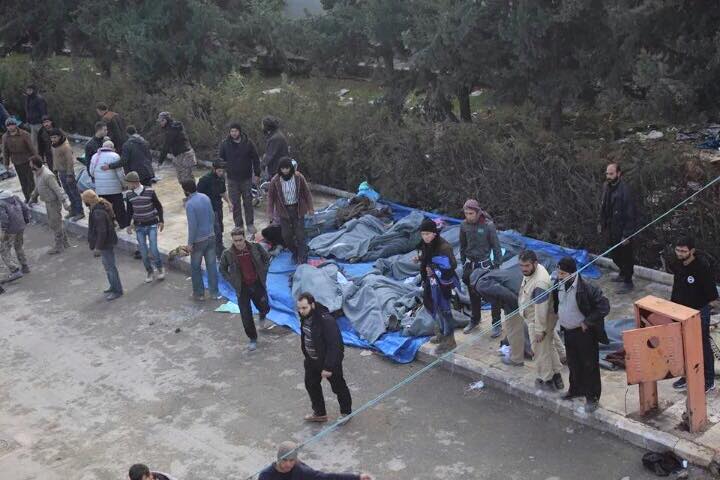 Dead bodies are lined up following an alleged Russian strike on Maarat al Numan, Jan 9th.